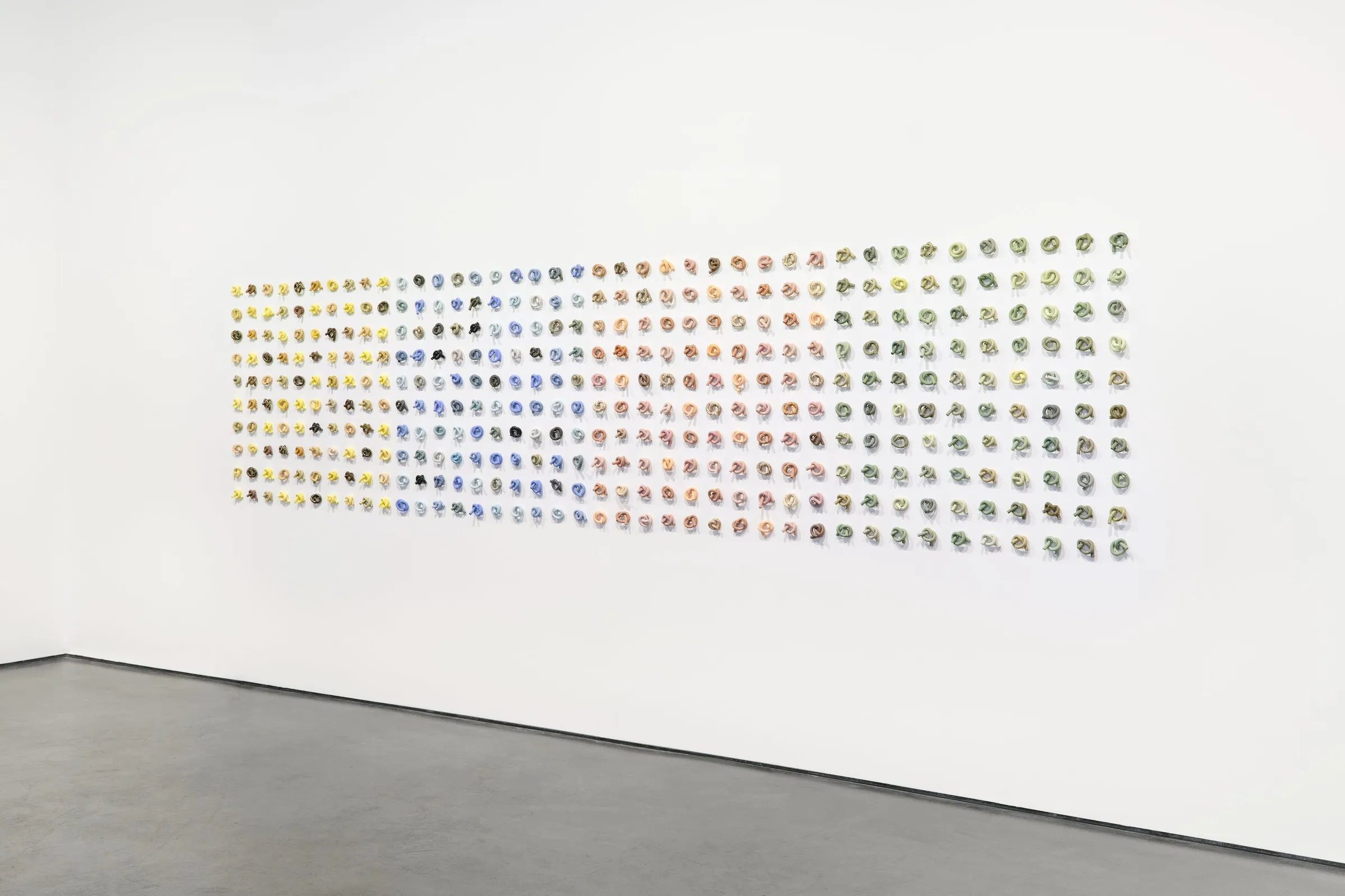 Not Wall No. 3 (2025) multi object ceramic and glaze, 480 x 120cm — Colour Working / Working Colour
