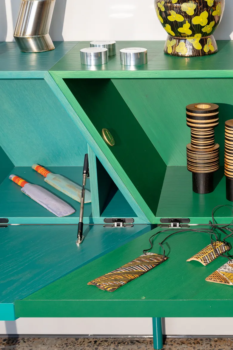 Bats from The Test Series by Minaal Lawn displayed on a green shelving unit at SuperFab Shop